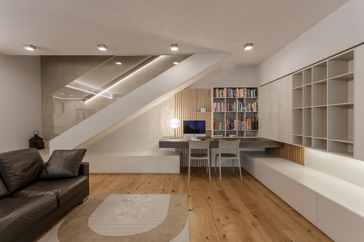 living-con-cucina-penisola-e-angolo-studio-1