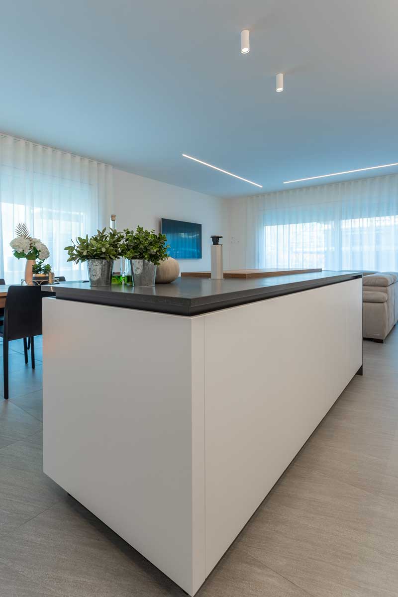 zona-giorno-open-space-cucina-isola-minimal-3